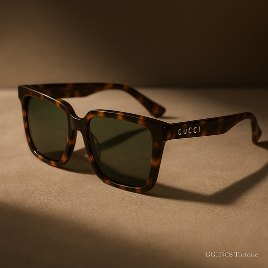 Tortoiseshell Gucci sunglasses on a beige surface with a brown background